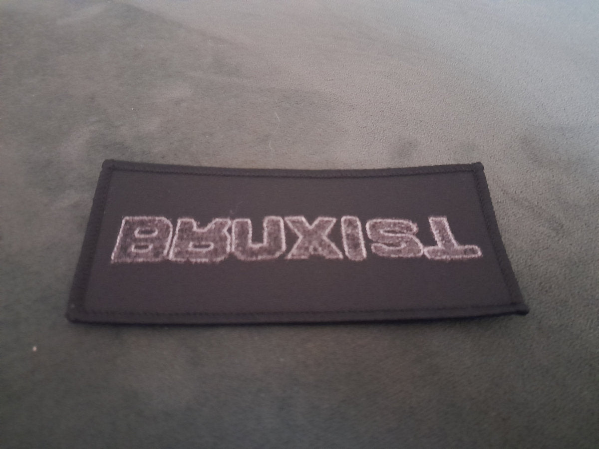 Bruxist, Logo Patch