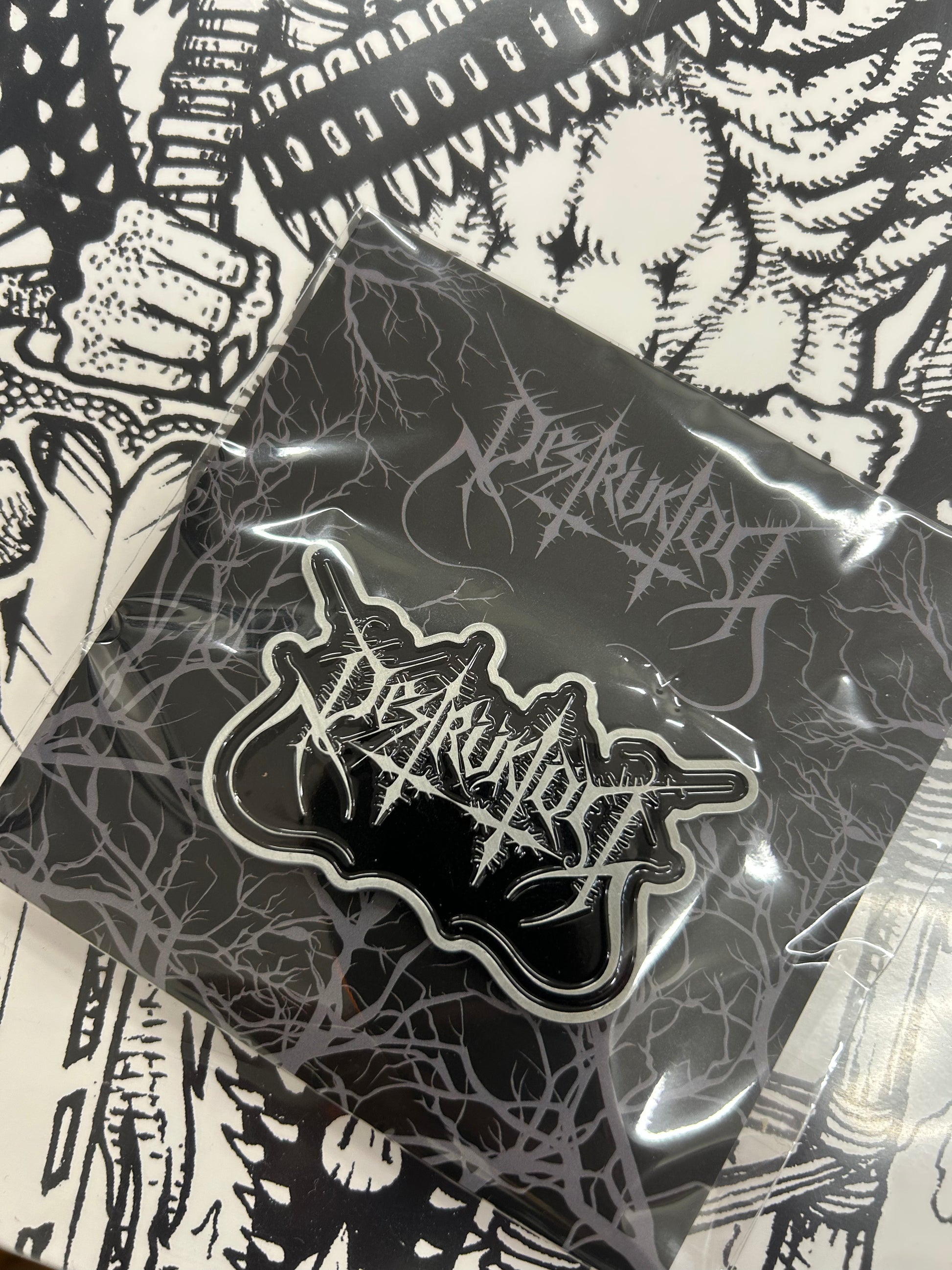 Destruktor, Logo Pins
